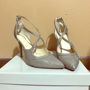 Size 9 pewter high heels. Worn for a few hours